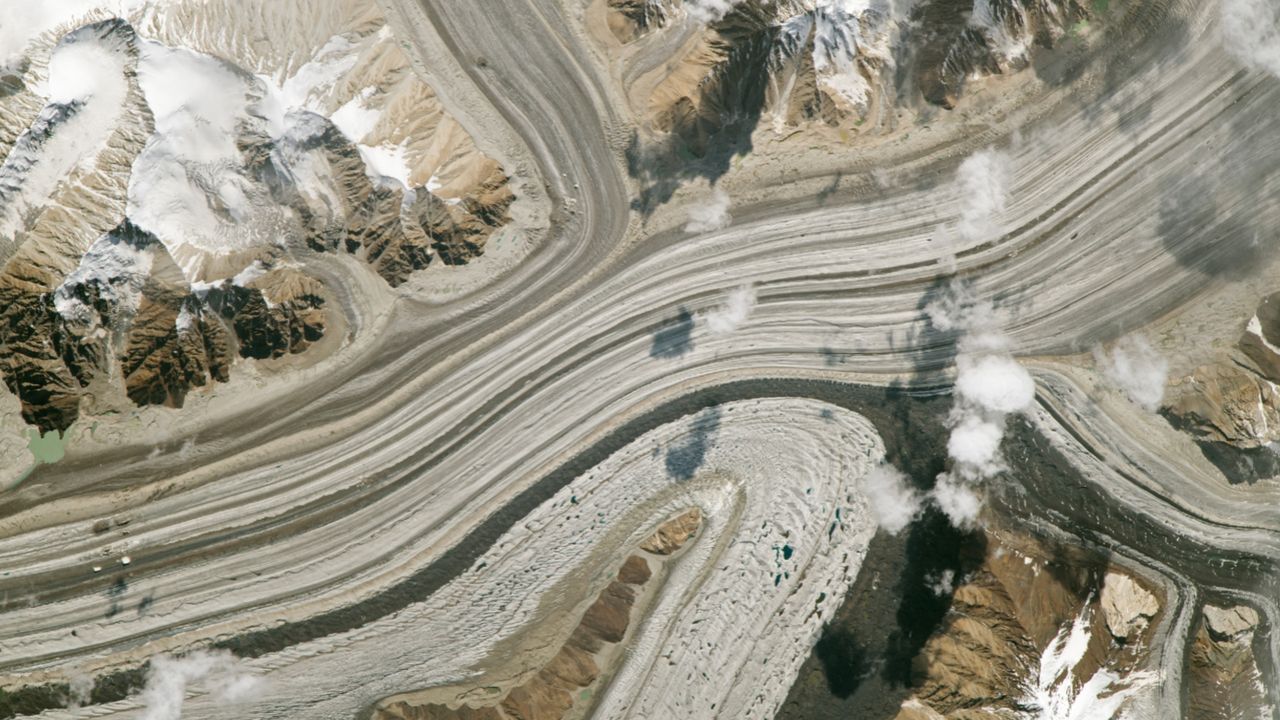 Trio of stripy glaciers merging in ‘Earth’s highest battleground’ are part of a major anomaly scientists don’t fully understand — Earth from space
