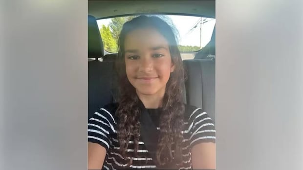 Vigil held for slain Quebec girl highlights collective grief on both sides of the border