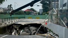 A sinkhole revives debate about migrant workers’ rights in Singapore
