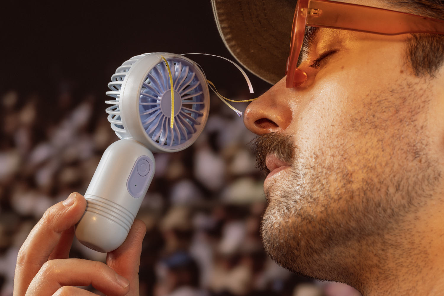 The hottest fashion accessory right now will make you super cool: mini portable fans