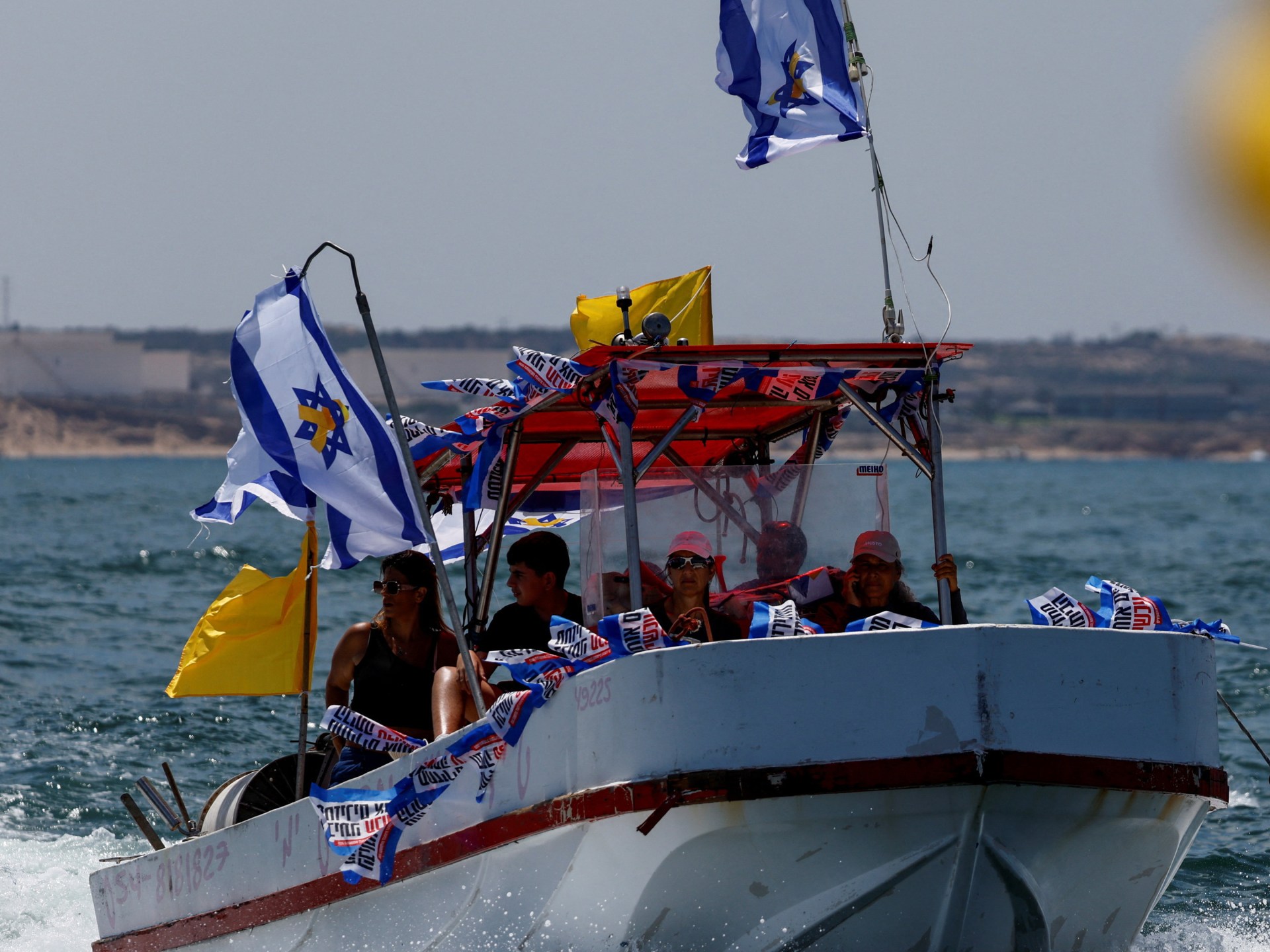 Families of Israeli captives sail near Gaza to call for a ceasefire