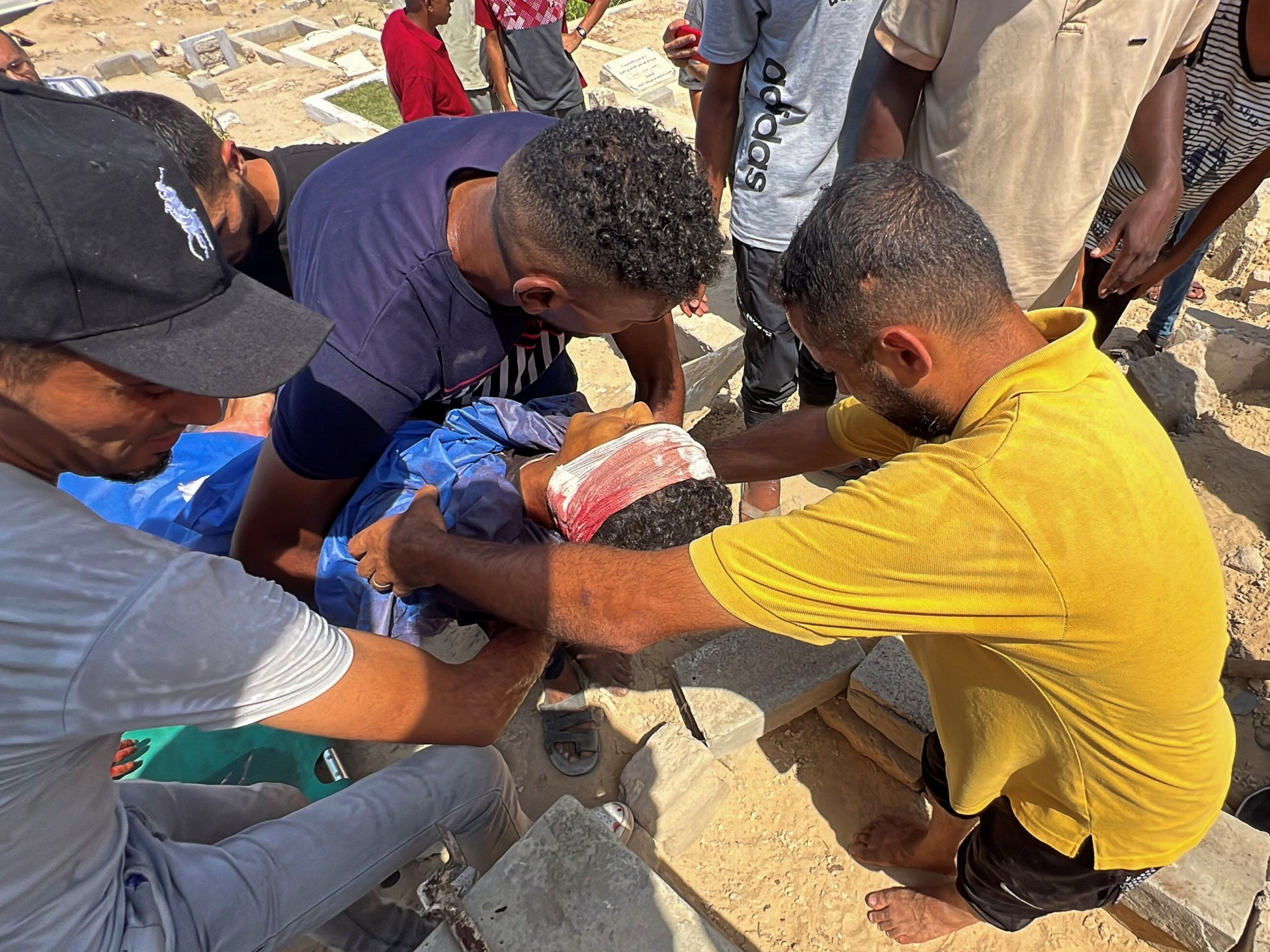 Palestinian boy killed in Gaza aid drop as starvation toll rises to 212