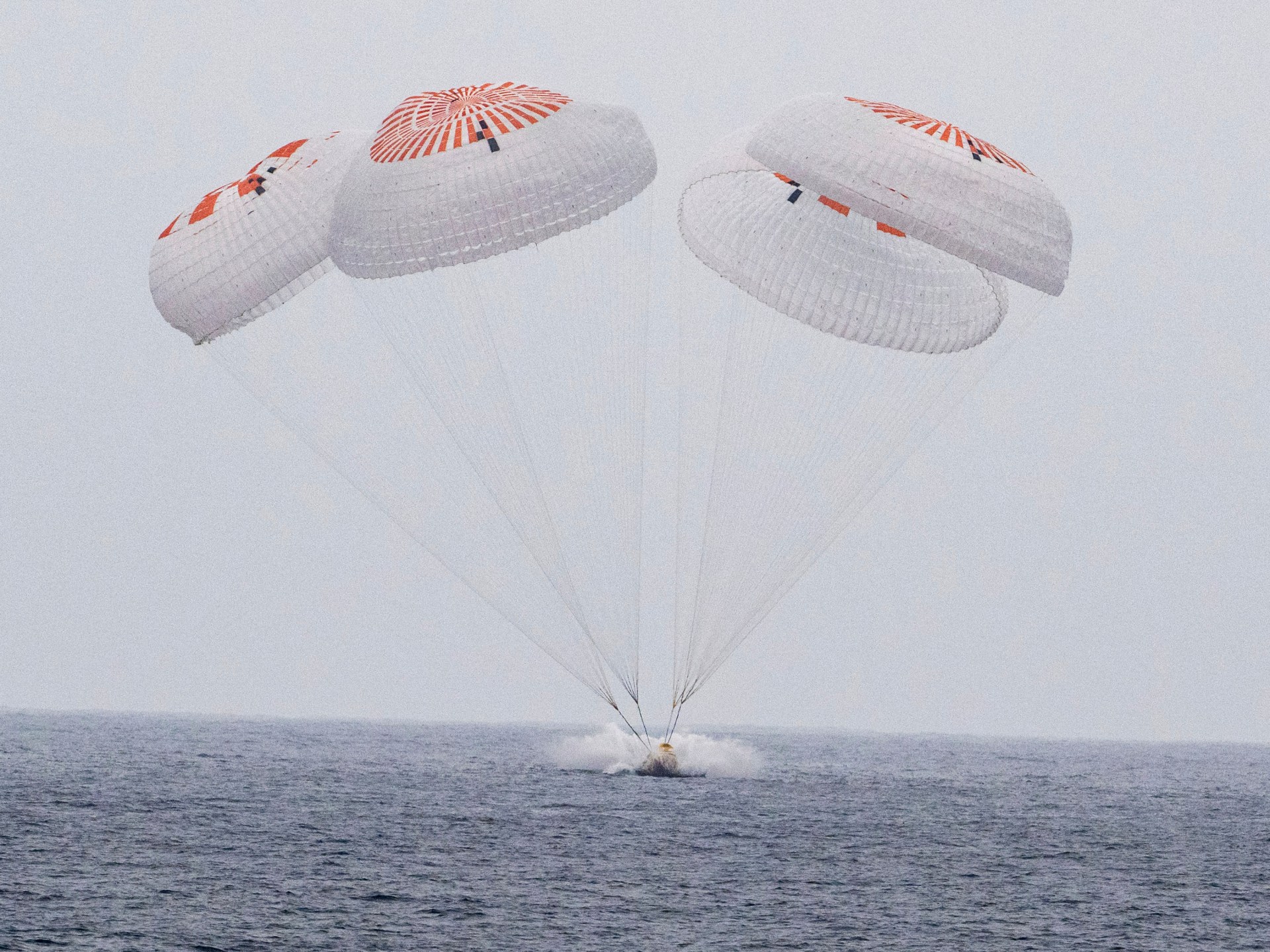 Astronauts return to Earth in SpaceX splashdown after 5-month ISS mission