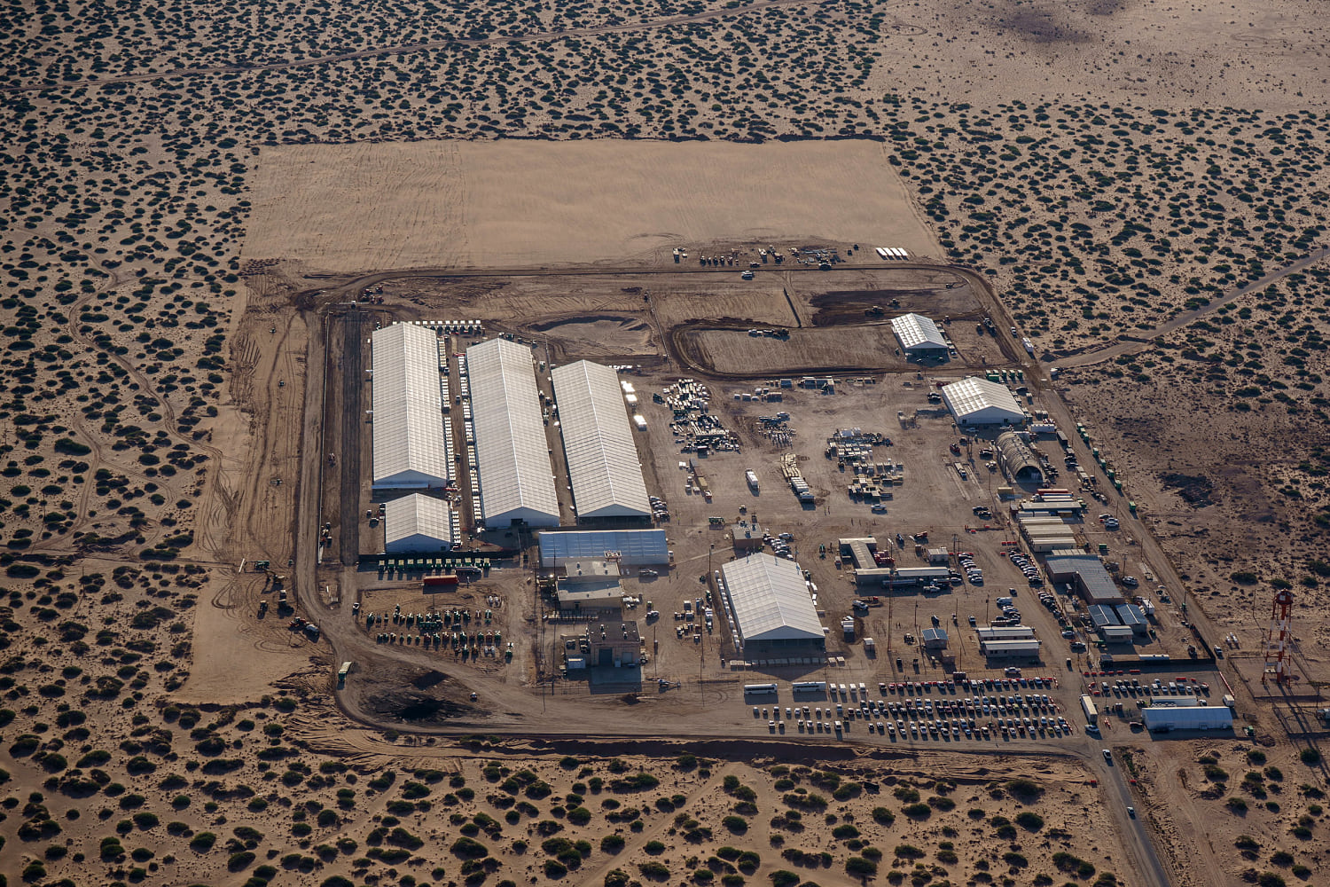 Trump administration hits hurdles as it builds a key immigrant detention facility