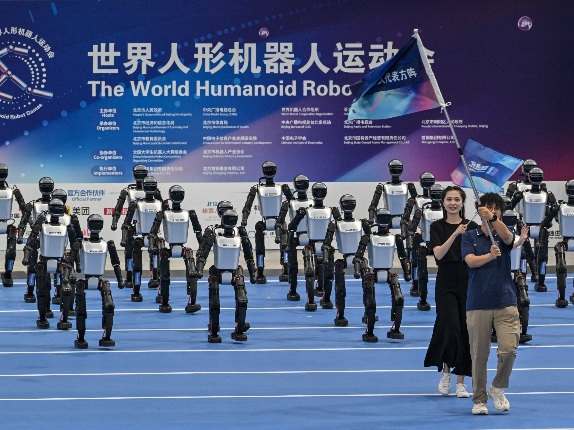Humanoid robots race and tumble at China’s first ‘robot Olympics’