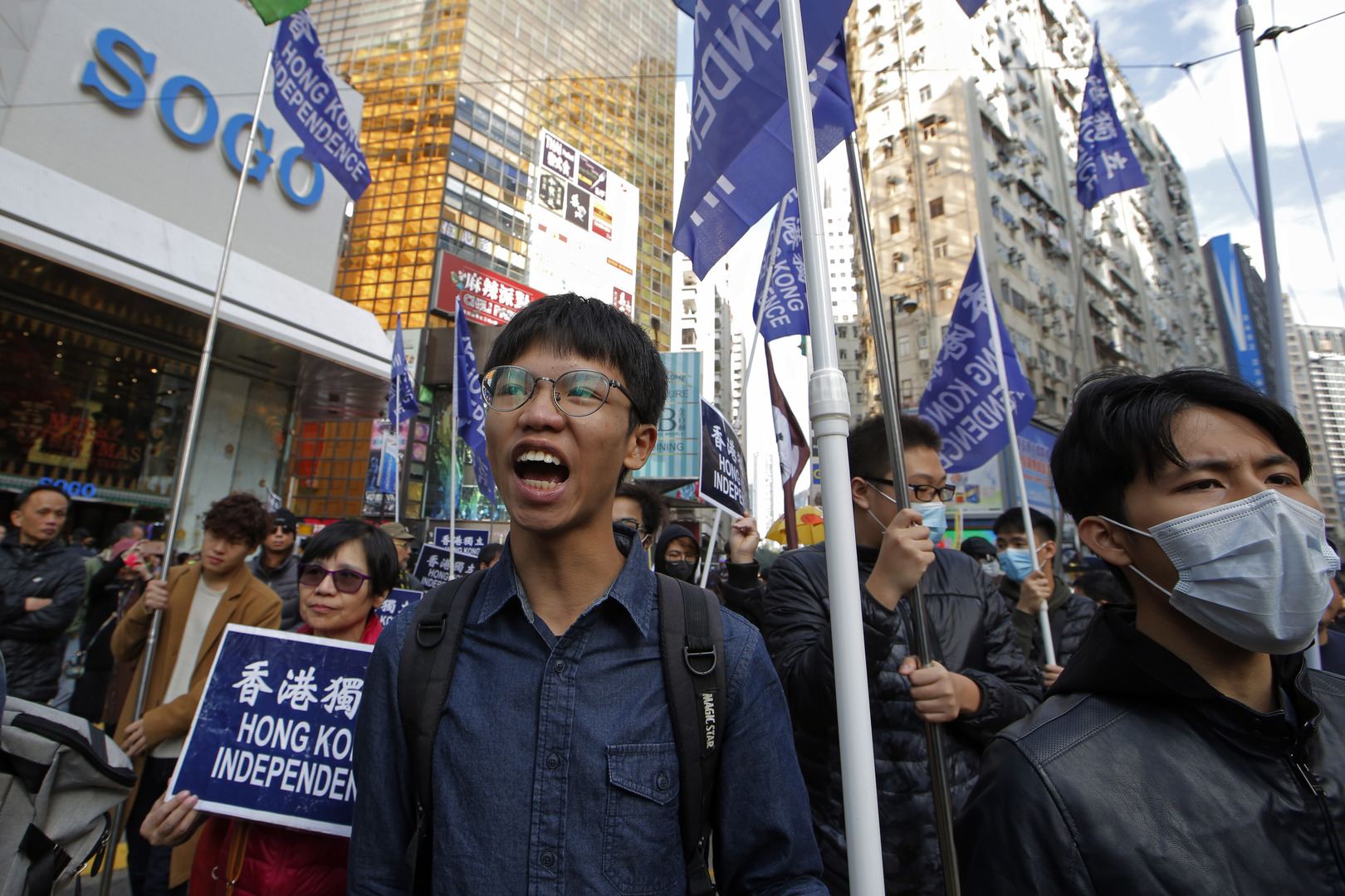 China angered as Hong Kong activists granted asylum in UK, Australia