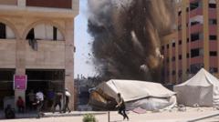 Palestinians flee Gaza City districts as Israel says first stages of assault have begun