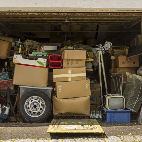 Americans’ junk-filled garages are hurting EV adoption, study says