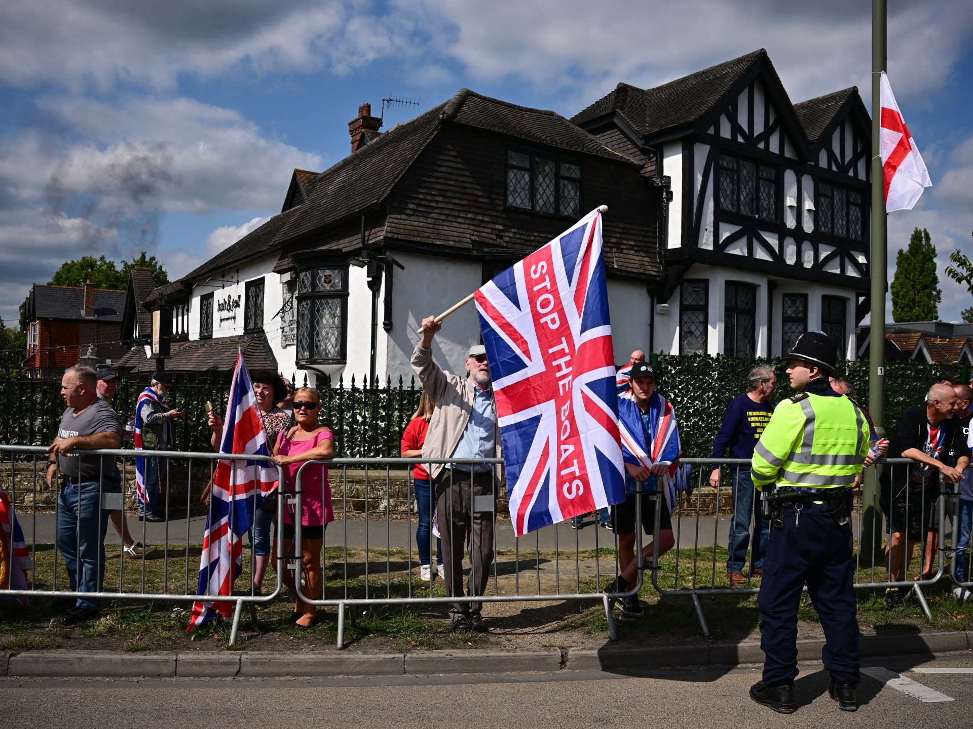 Scuffles, arrests as protesters across UK rally against asylum hotels