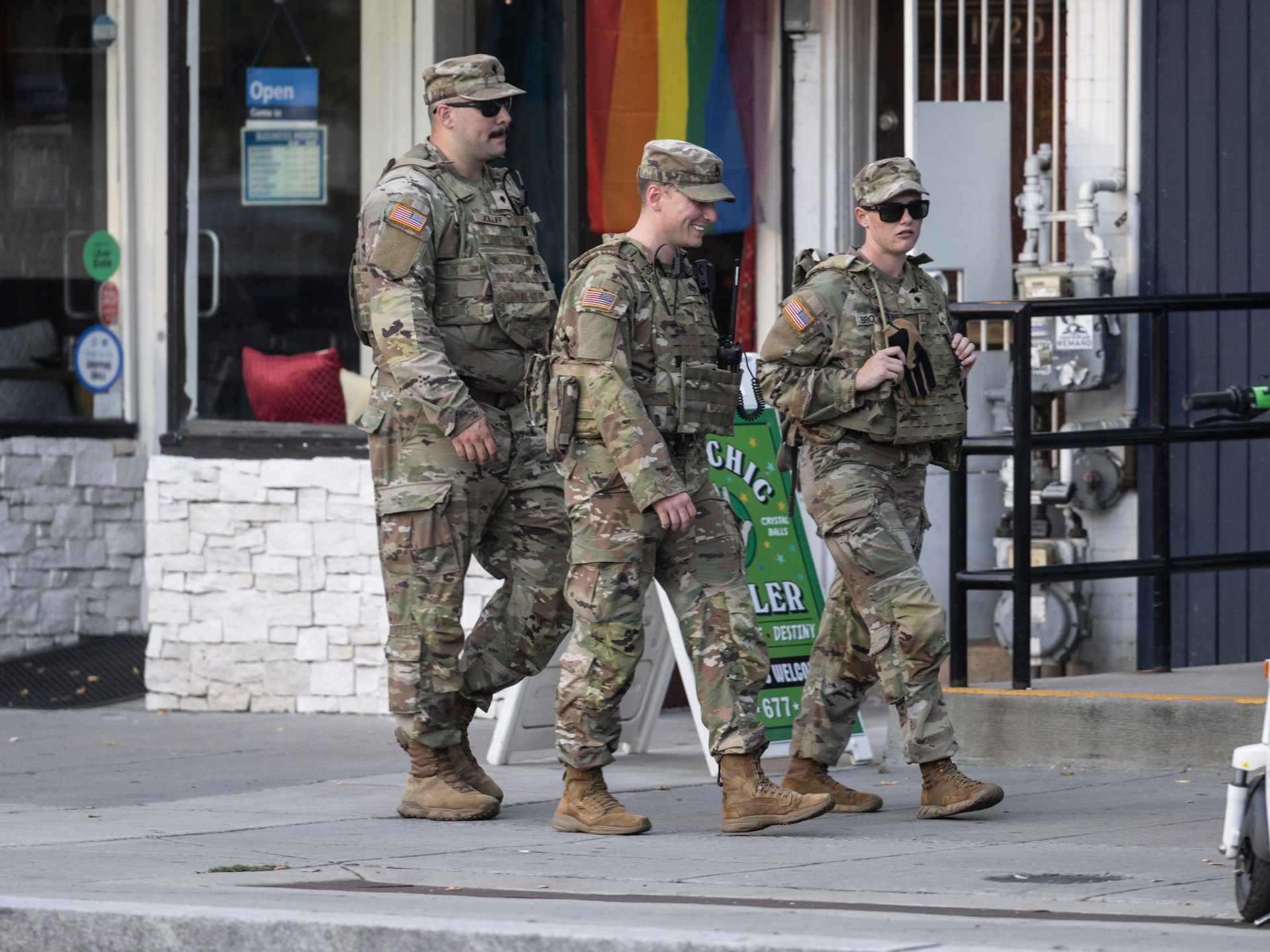 US National Guard troops begin carrying weapons in Washington, DC