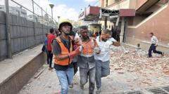 Four journalists among 15 killed in Israeli strike on hospital, Gaza officials say