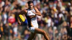 Former player makes Aussie Rules history by coming out as bisexual
