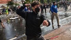 Three dead after protests over death of taxi driver in Indonesia