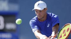 US Open star gives boy cap after viral snatching video