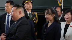 North Korea’s Kim arrives in Beijing with daughter to attend massive military parade
