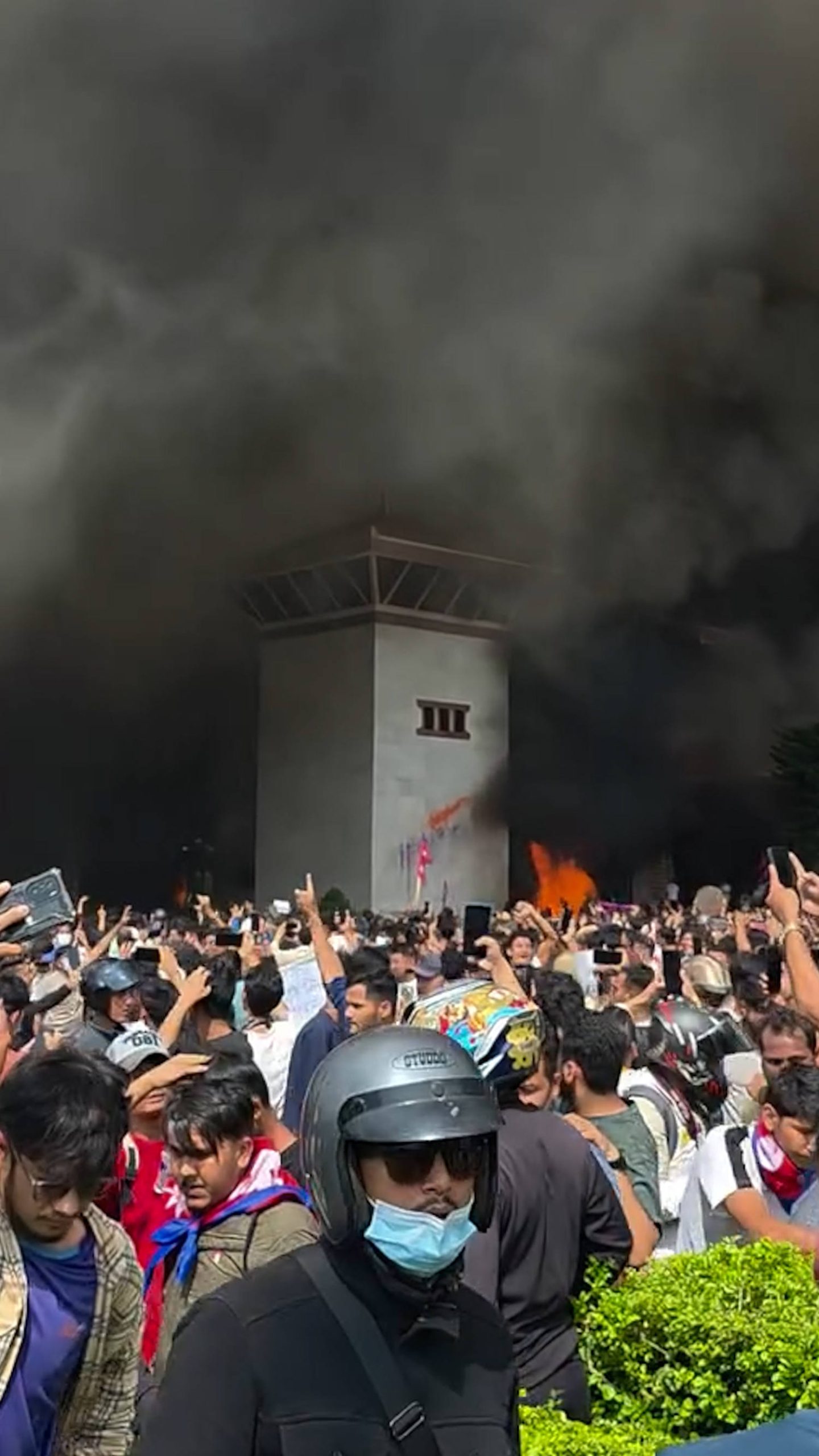Protesters set fire to Nepal’s parliament building