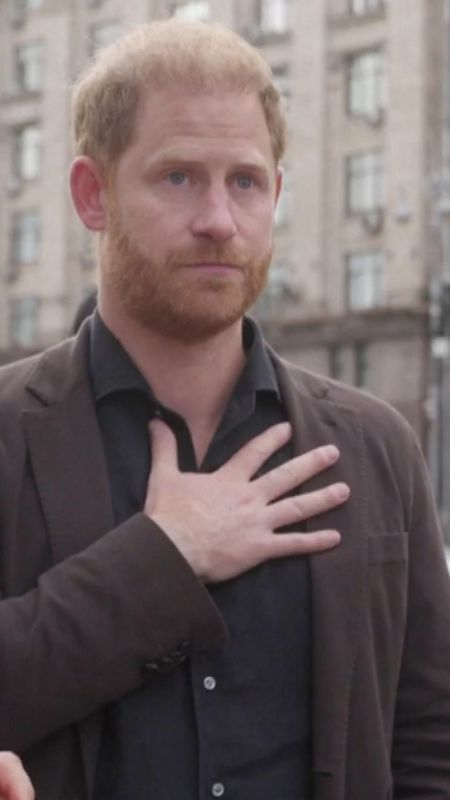 Prince Harry holds back tears at Ukraine memorial