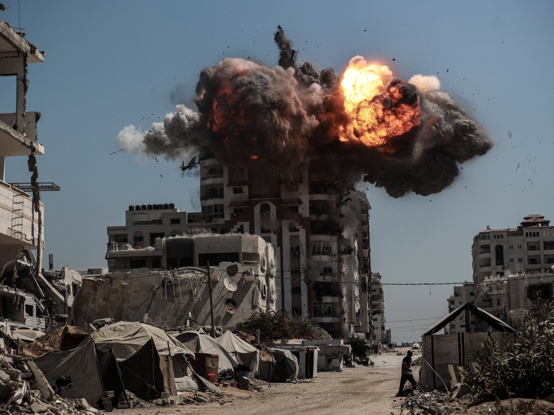 Israel kills 53 in Gaza, flattens more towers as toll from famine rises