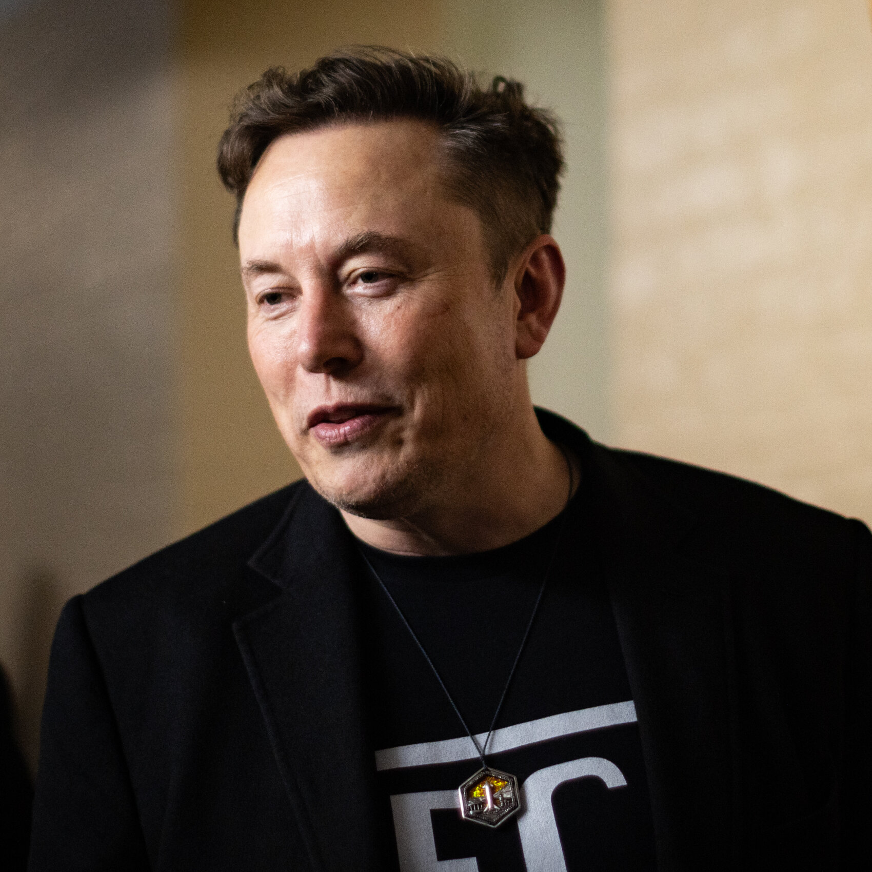 Elon Musk Buys $1 Billion in Tesla Stock as Board Defends His Pay