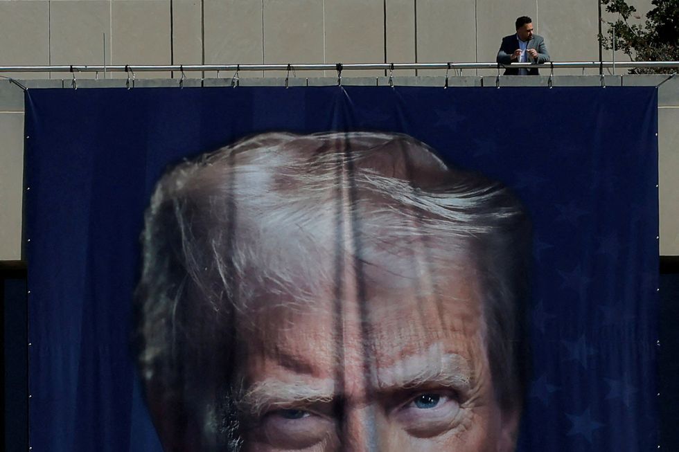 Exposed: Trump’s pricey bid to hang giant ‘Orwellian’ banners of his face on gov buildings
