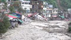 Homes damaged, cars swept away as rains flood India’s Uttarakhand