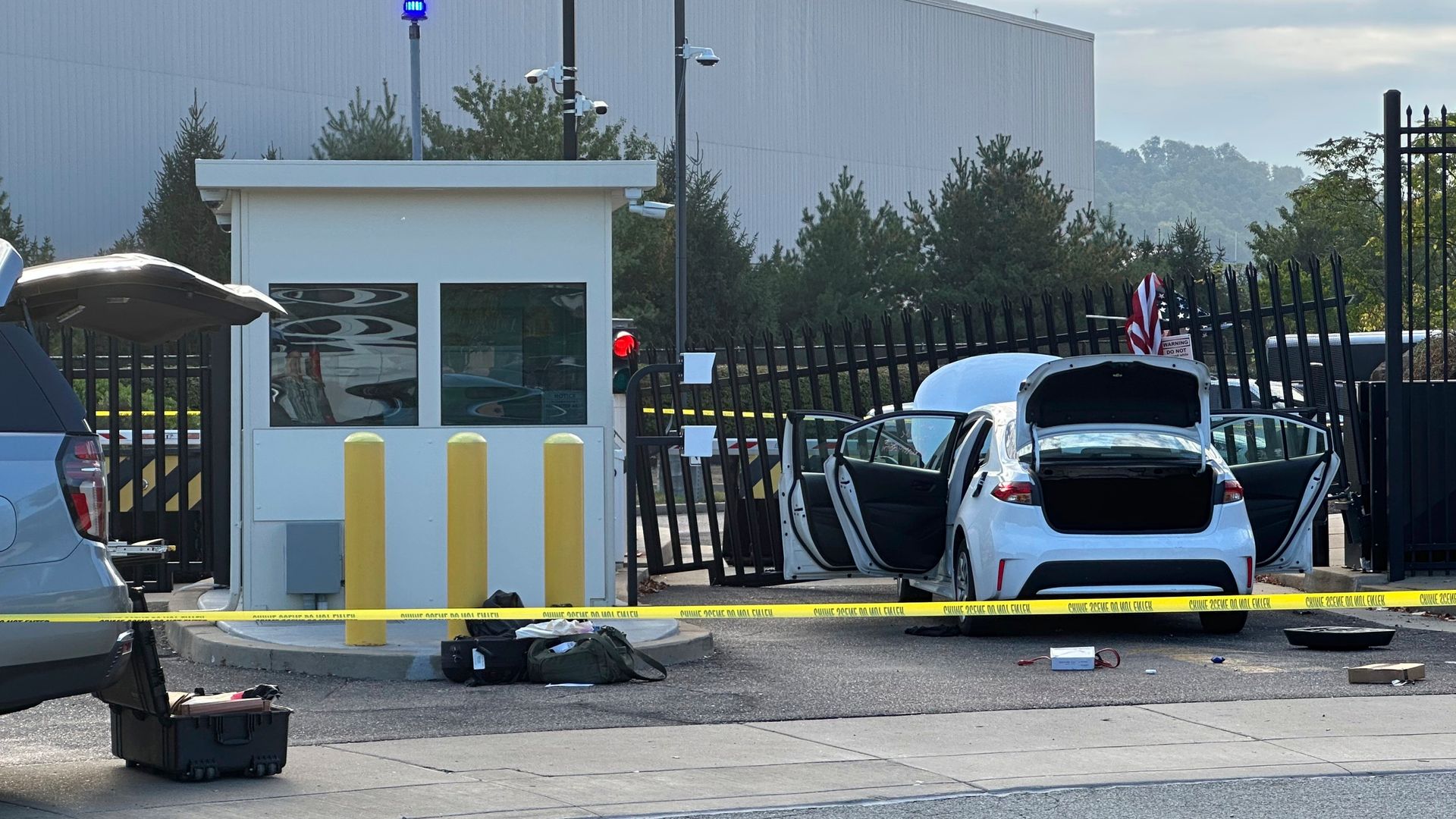 Suspect in custody after driver crashed ‘at high speed’ into FBI office gate ‘in act of terror’
