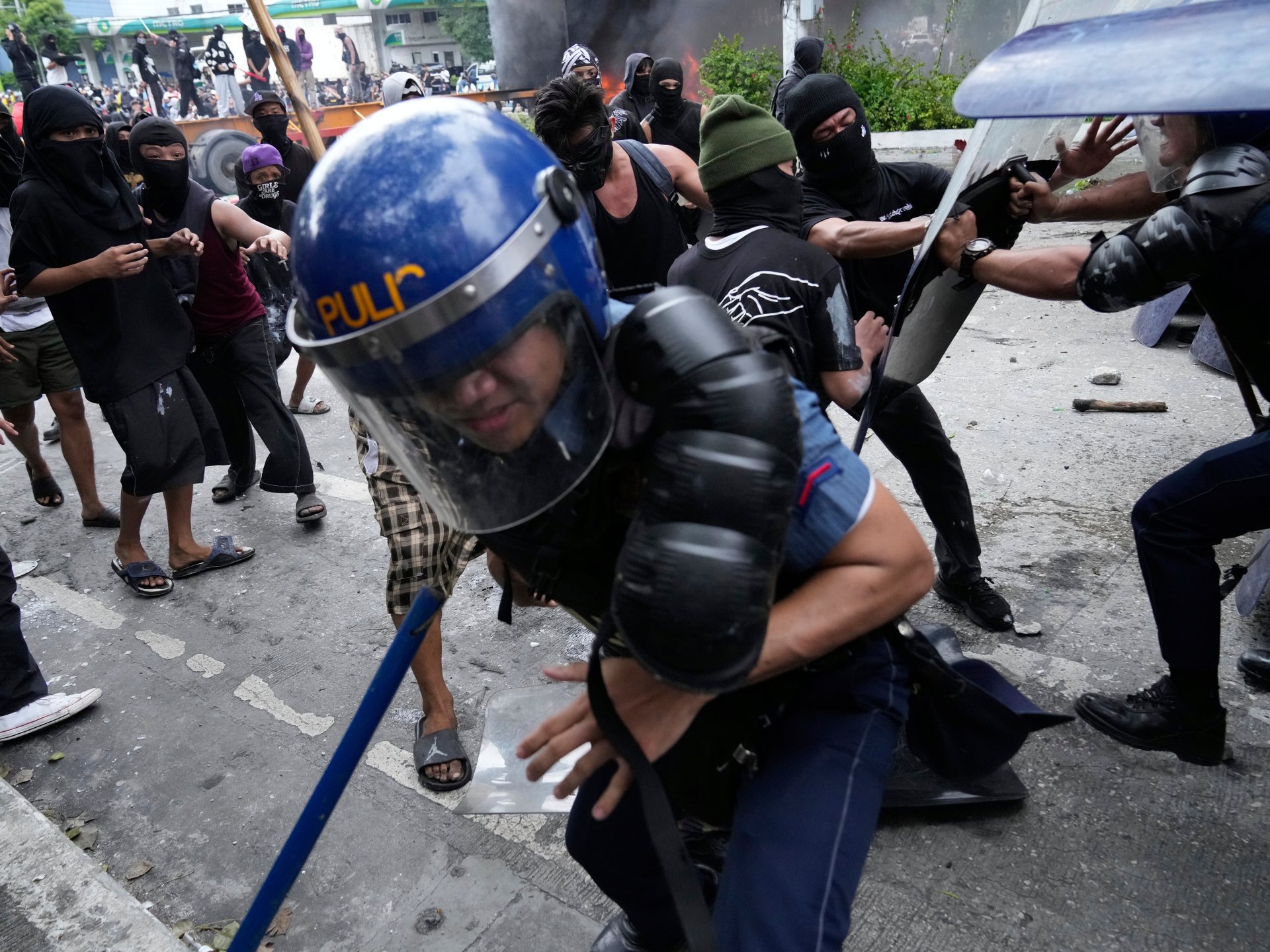 More than 200 arrested after anticorruption protests in Philippines