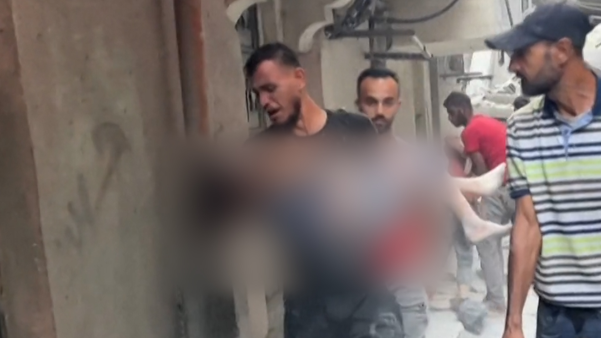 Video: Parents carry children’s bodies after Israeli attack on Gaza City