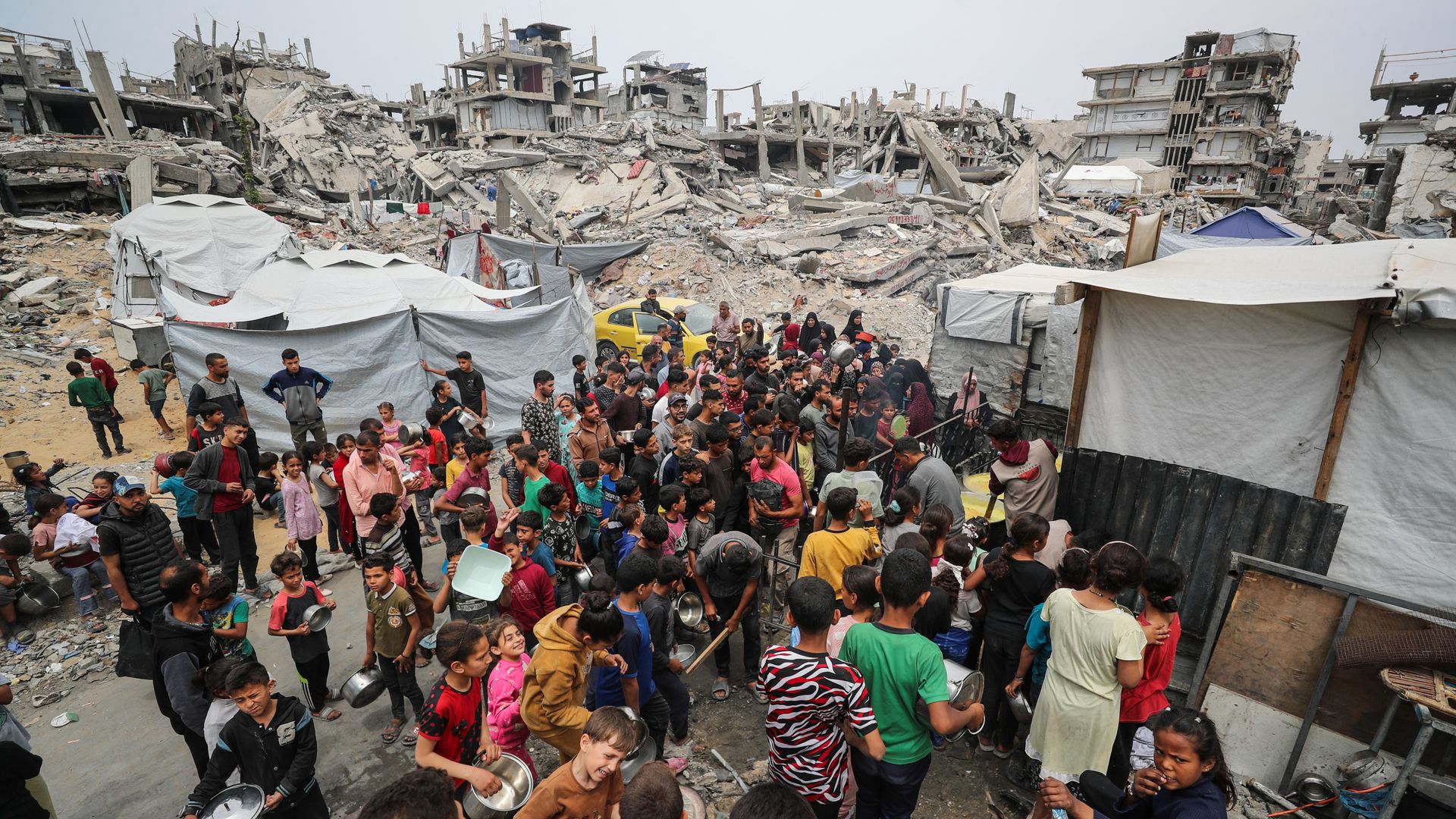 Trump tells Israel ‘stop bombing Gaza’ – as Hamas agrees to release Israeli hostages, and to parts of peace deal