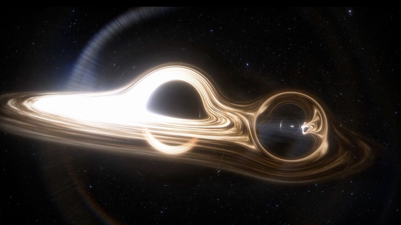 Groundbreaking image shows two black holes orbiting each other for first time