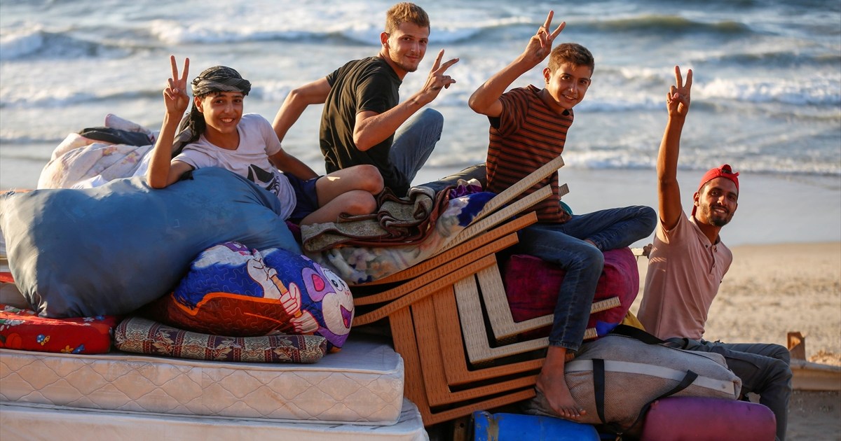 LIVE: Palestinians return to destroyed Gaza homes as Israel ceases fire