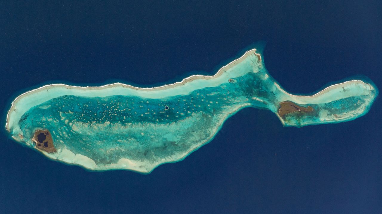 The whale-shaped island in Belize with a ‘great blue blowhole’ — Earth from space
