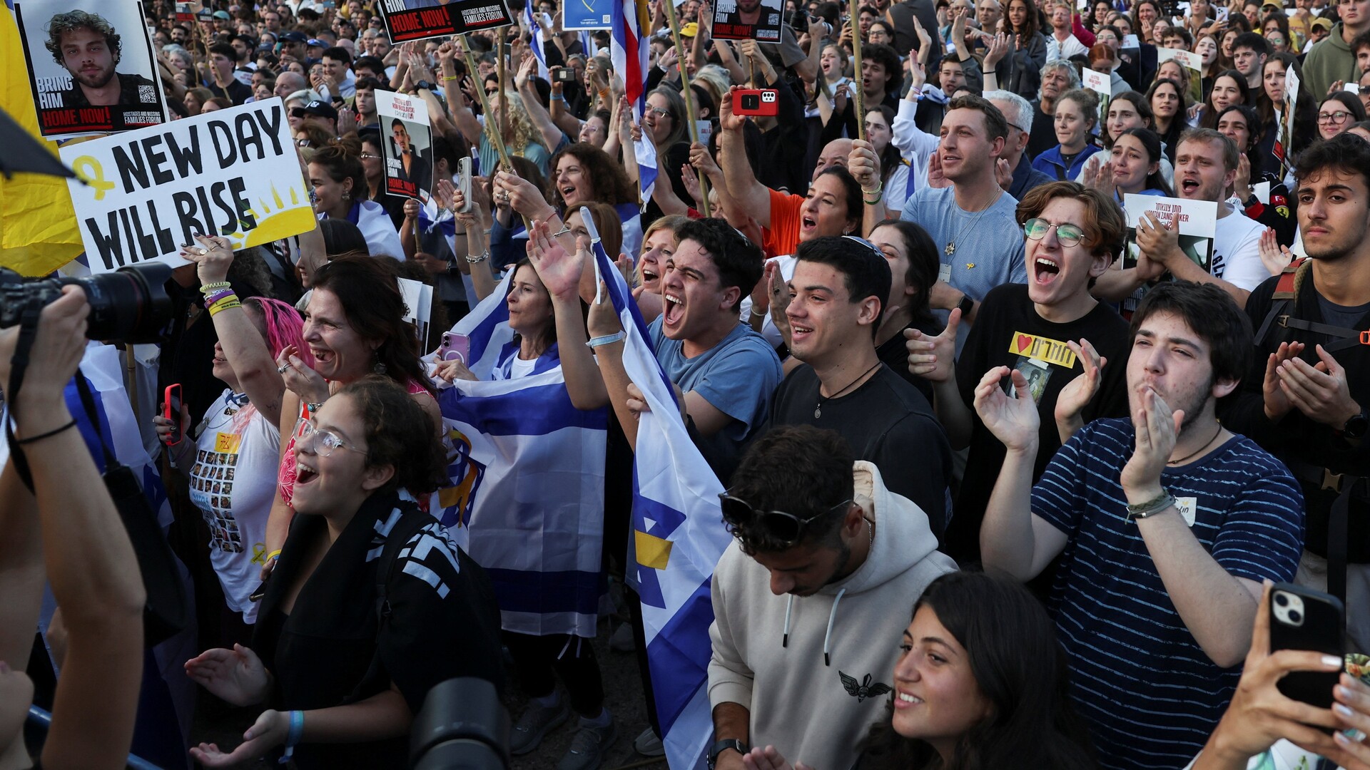Israelis cheer as Hamas hands first captives over to the Red Cross