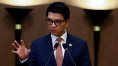 Madagascar president hiding in ‘safe place’ as he warns of coup attempt