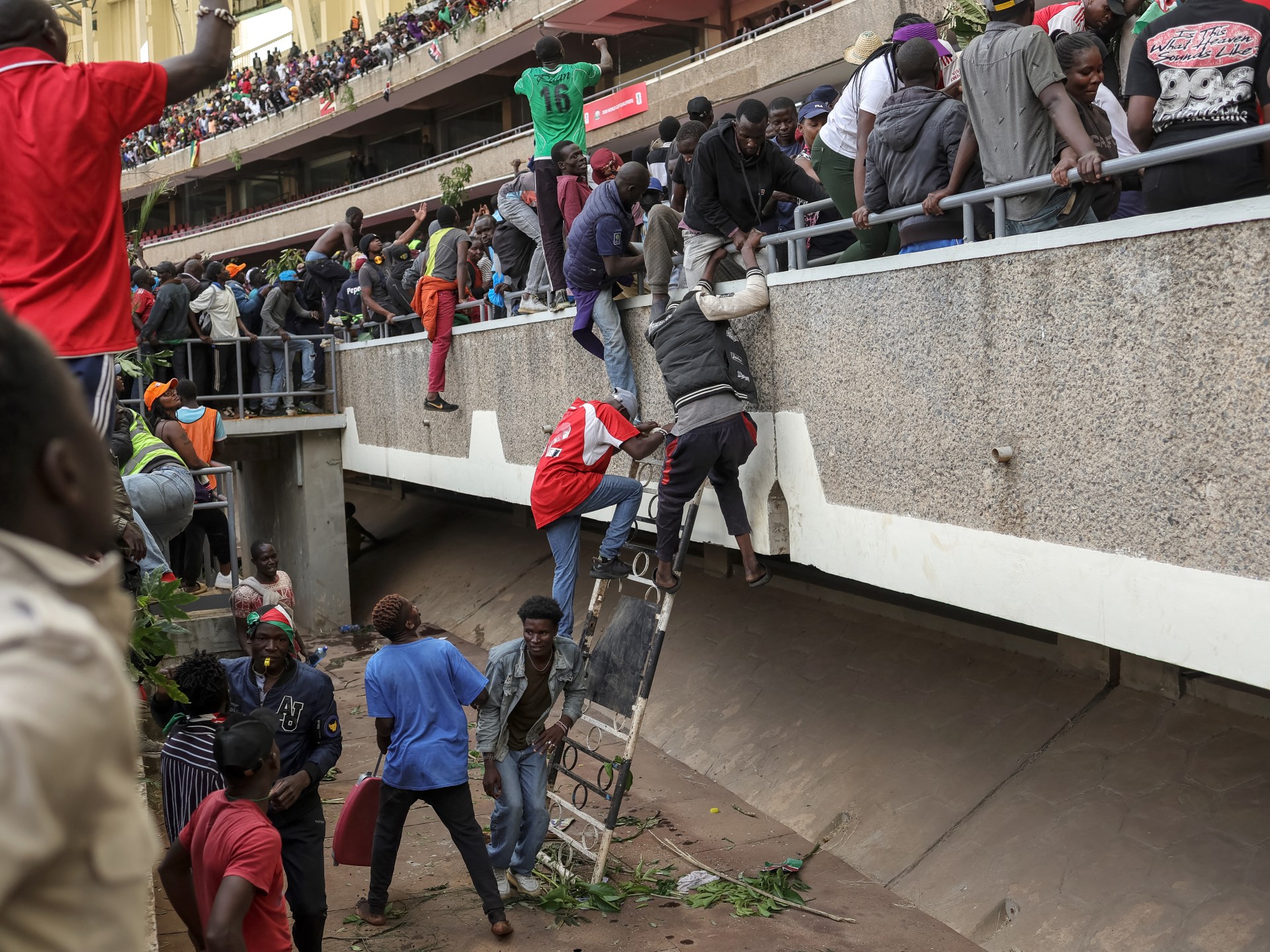 Police in Kenya fire tear gas to disperse mourners at Raila Odinga viewing