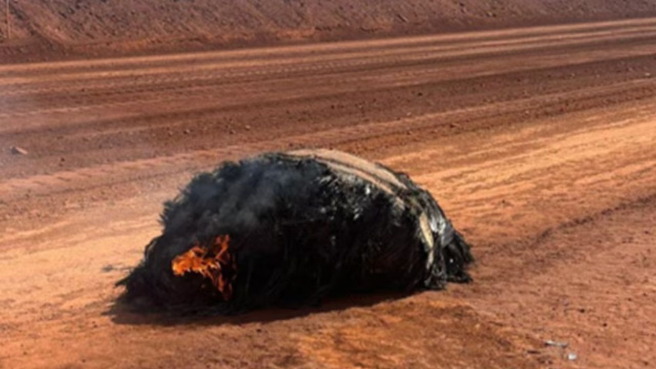 Charred piece of secretive Chinese rocket found still smoldering in the Australian outback