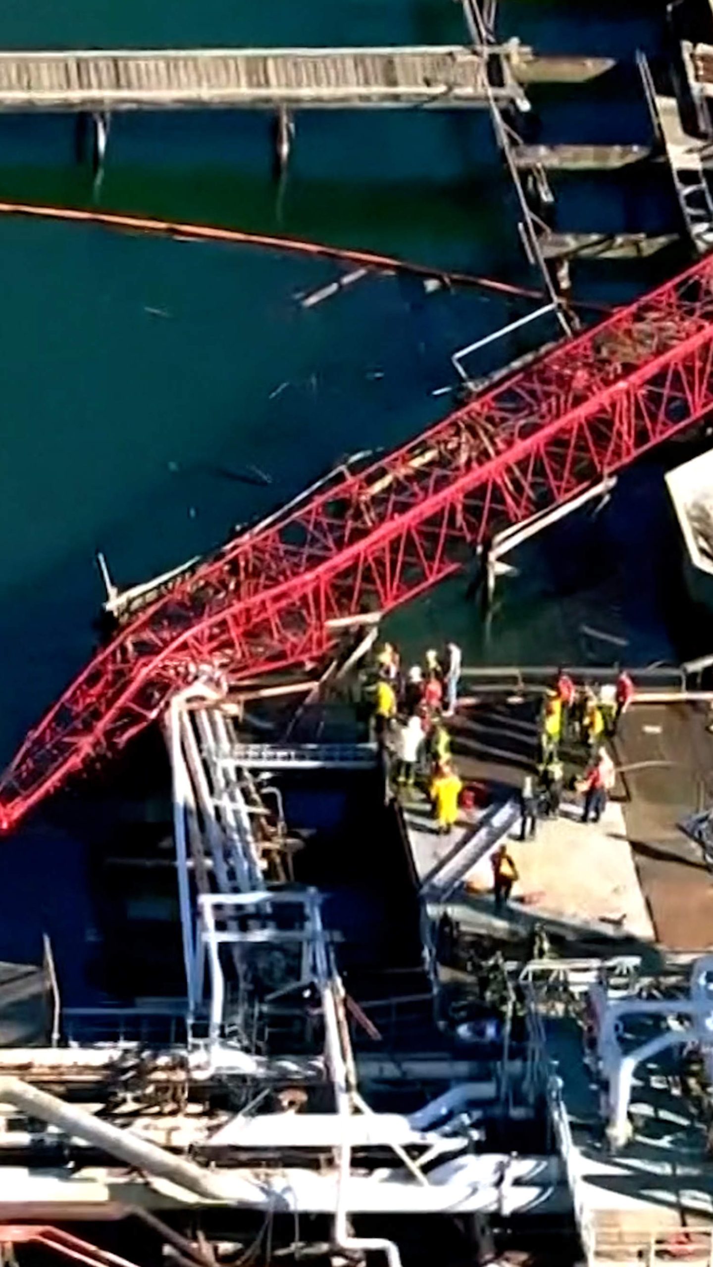 Crane collapse kills two people at construction site