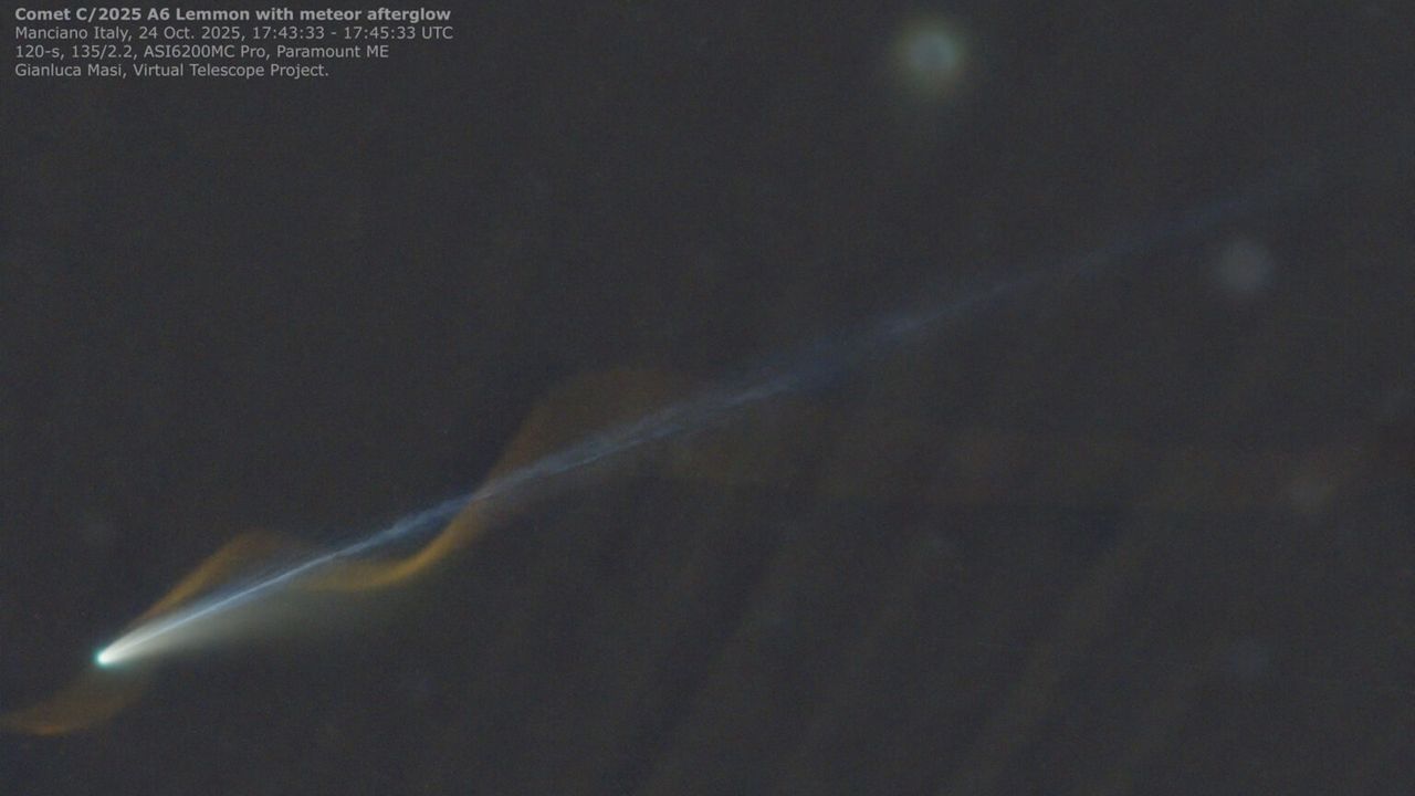 ‘Miracle’ photo captures Comet Lemmon and meteor seemingly entwined over Earth