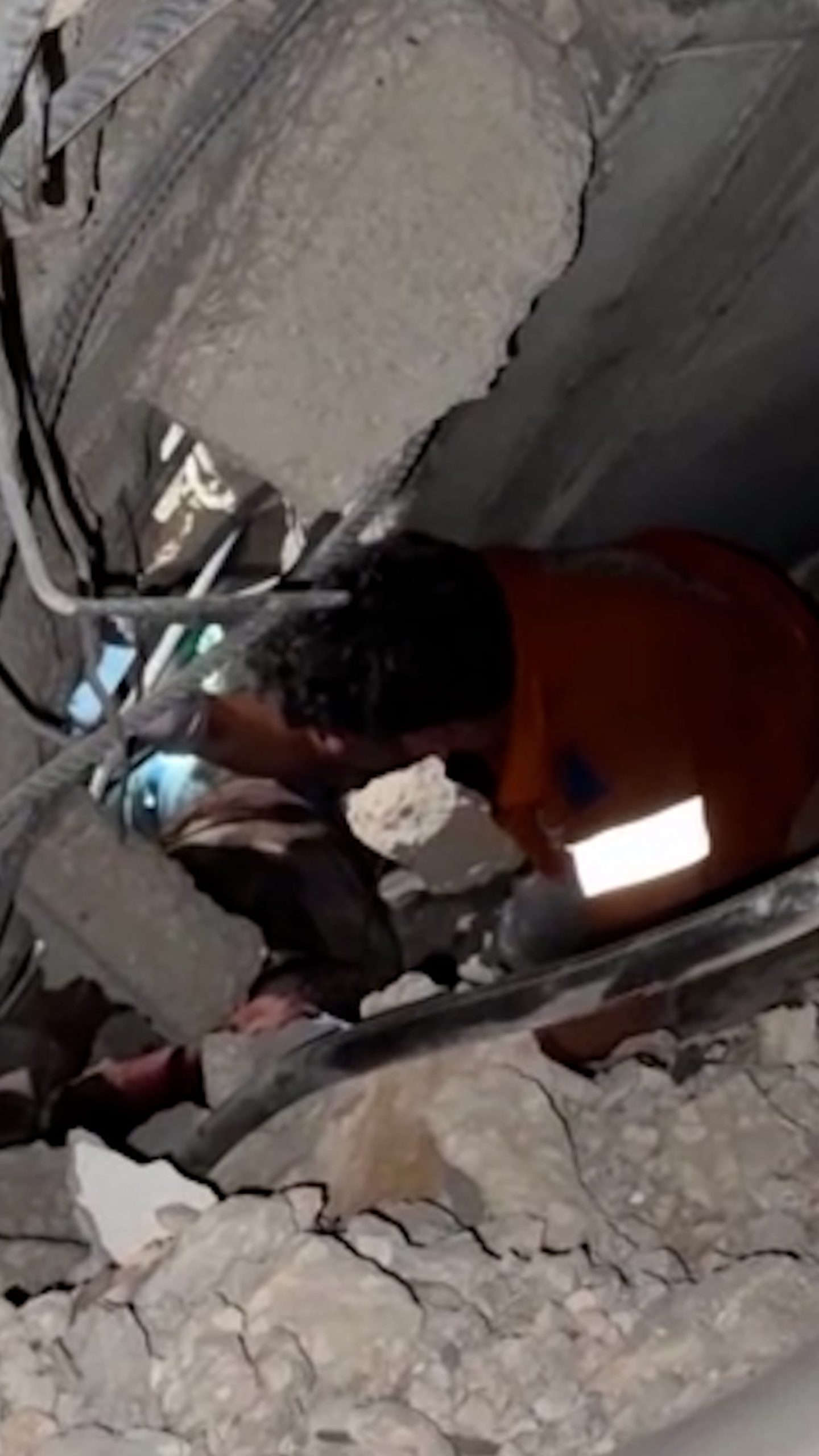 Rescuers dig through rubble after Israel strikes Gaza