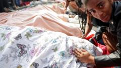 At least 132 killed in Rio police raid, officials say