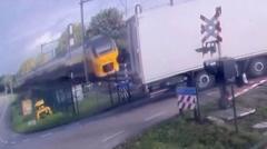 Watch: Train smashes into truck at Dutch level crossing