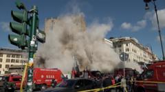 Watch: Moment medieval tower partially collapses in Rome