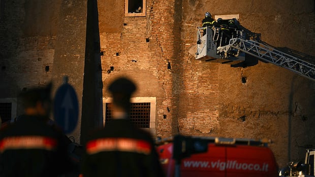 Man extracted from partially collapsed medieval tower in Rome dies soon after