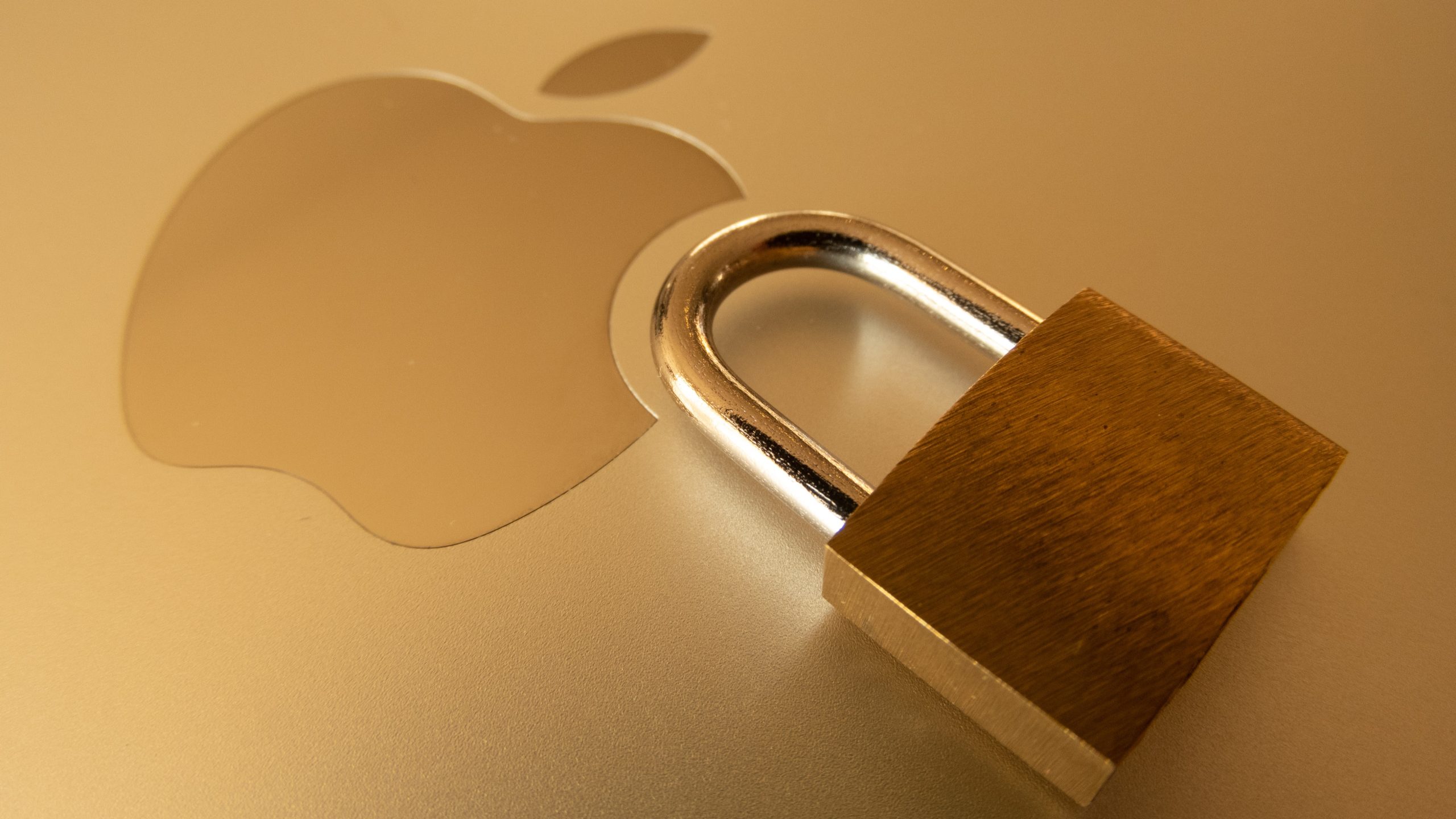 What are ‘Background Security Improvements’ on Apple devices?