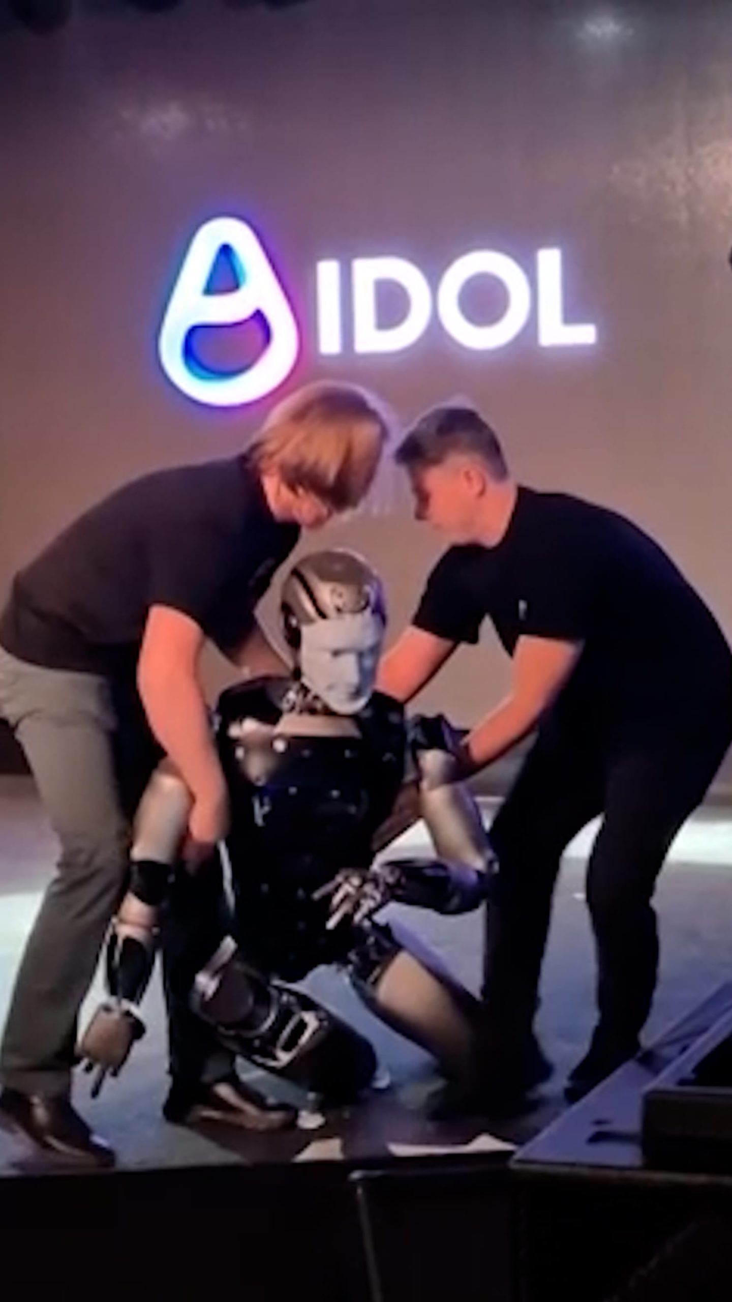 Russian AI robot falls face down on stage during debut