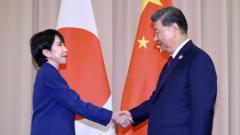 China summons Japan ambassador as war of words over Taiwan drags on