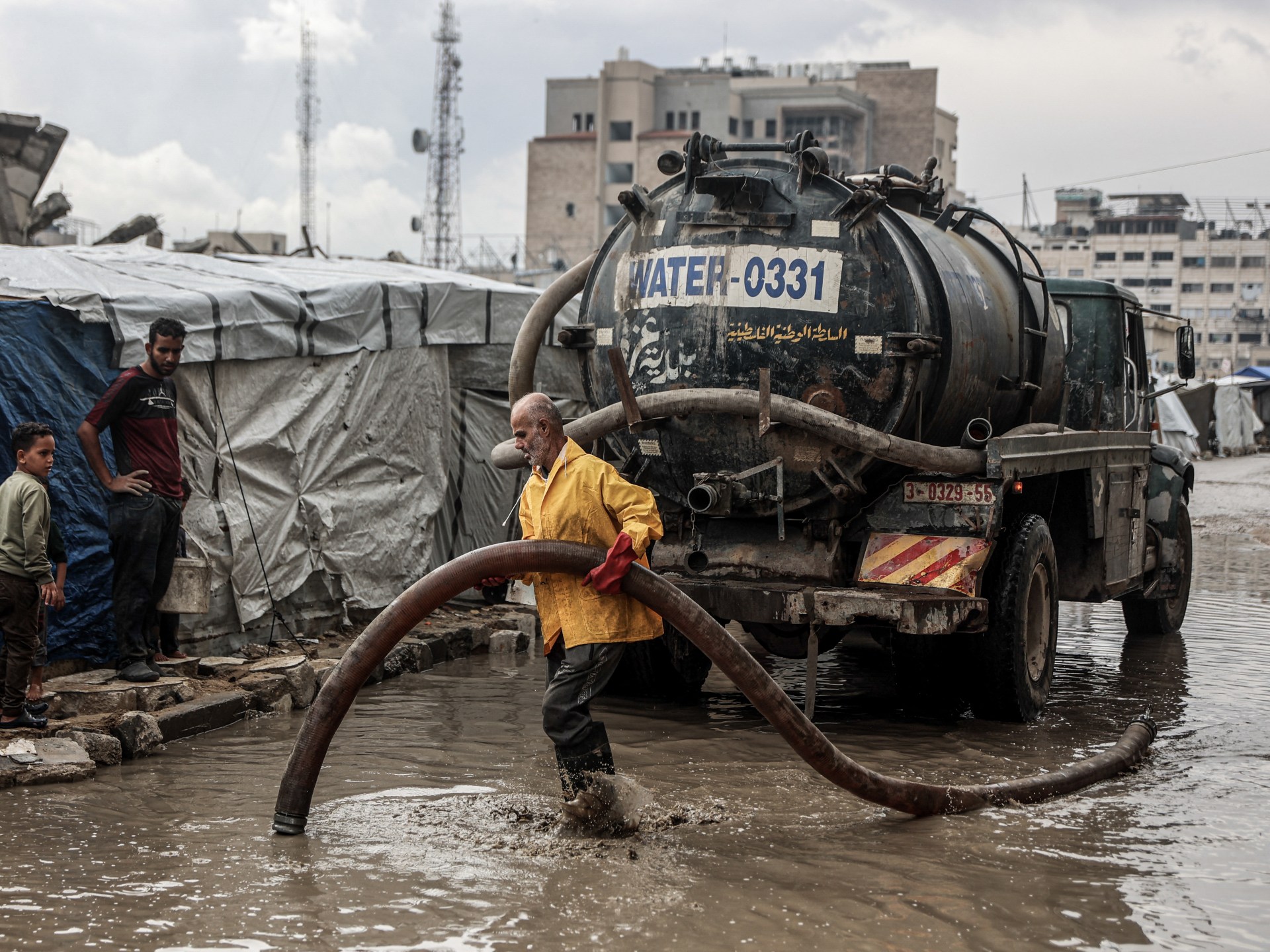 Palestinians reel under winter rains as Israel blocks Gaza shelter supplies