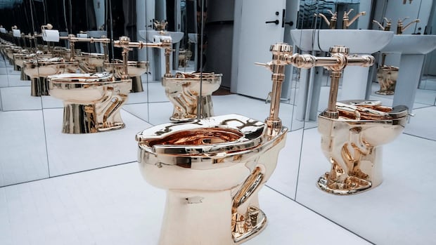 A solid gold toilet called ‘America’ and reportedly worth millions, is up for auction