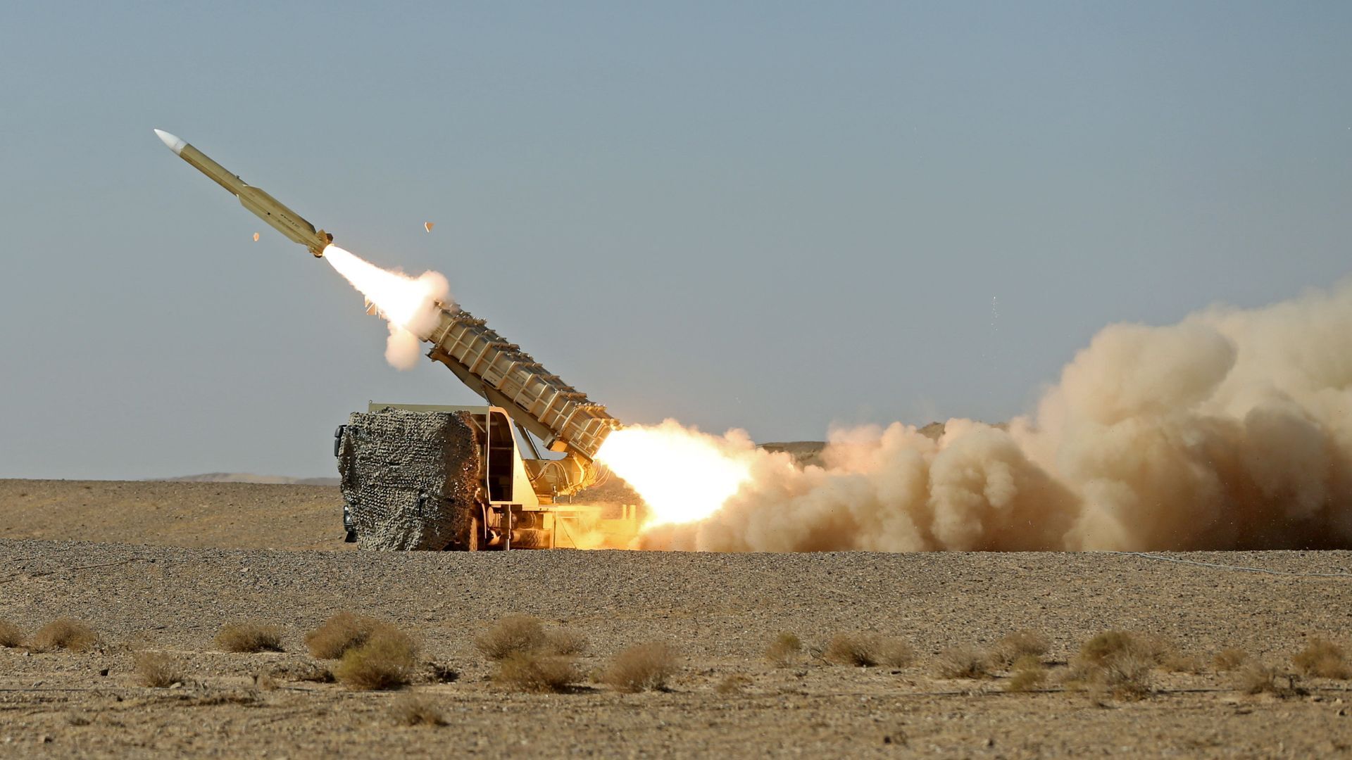 What are the consequences of an escalating global arms race?