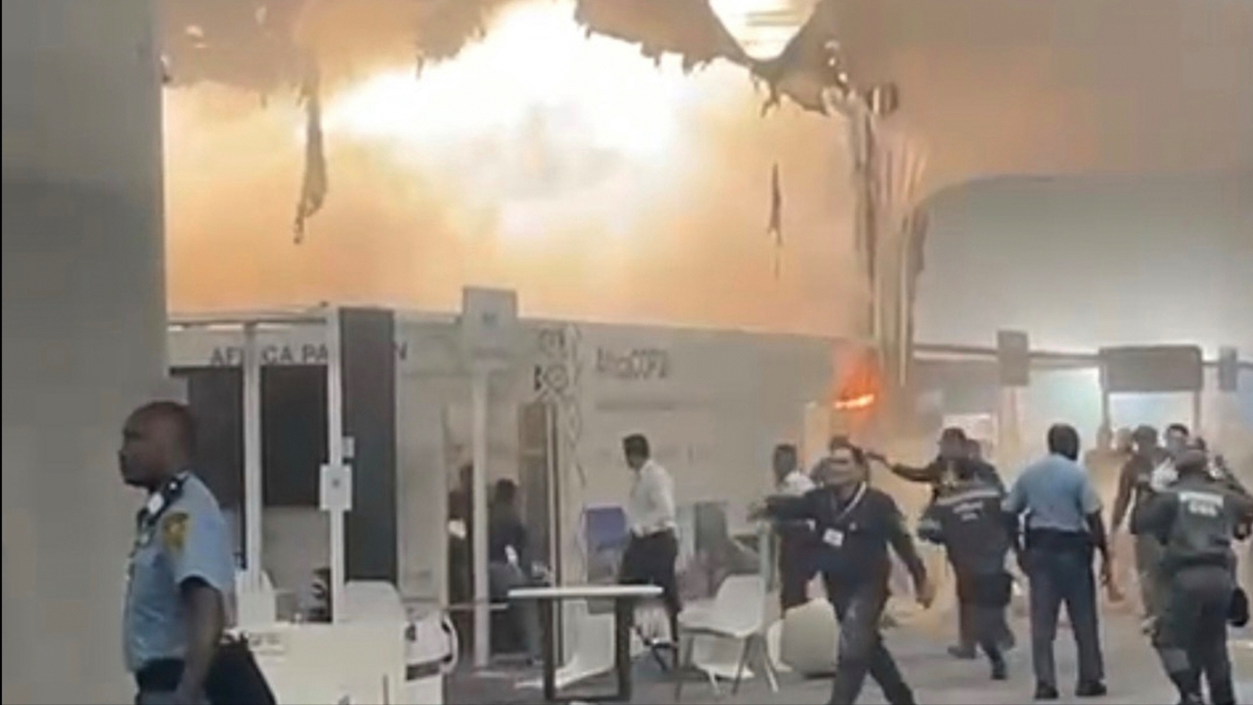 Fire prompts evacuations at U.N. climate talks in Brazil; 13 suffer smoke inhalation